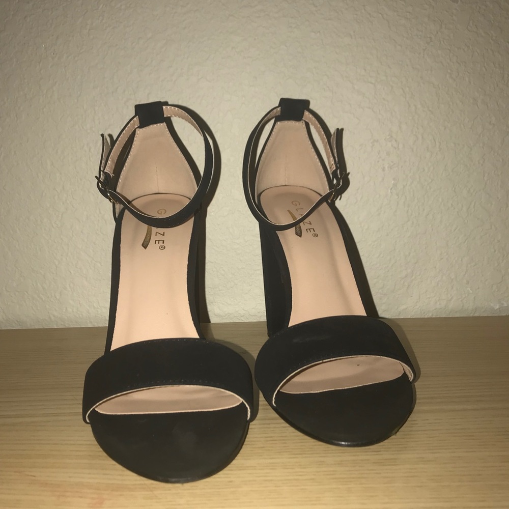 Elegant black strap heels